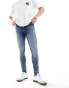 Фото #1 товара ASOS DESIGN spray on jeans with power stretch in dark wash blue