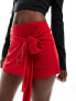 ASOS DESIGN slinky flippy skort with front tie detail in red