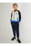 Фото #1 товара Спортивный костюм для мальчиков RolyPoly - Петроль 2-7 лет
