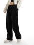 Only pleat front tailored trousers in black