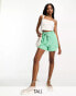 Фото #1 товара Pieces Tall exclusive tie waist flowy shorts in green ditsy