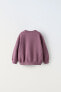 Plush sweatshirt with contrast seams