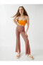 Фото #1 товара Geometrik Baskılı Yırtmaç Detaylı Kadın Pantolon