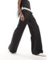 Extro & Vert tailored pinstripe trouser with asymmetric waistband in black co-ord