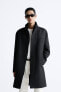 Coat with double collar