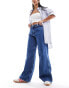 Фото #8 товара Tommy Jeans Claire high waisted jeans in mid wash