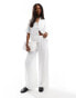 Фото #1 товара In The Style textured wide leg trouser co-ord in white