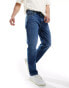 Фото #1 товара Tommy Jeans regular tapered dad jeans in mid wash