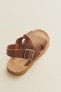 Leather crossover sandals