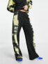 Фото #1 товара ASOS DESIGN oversized jogger with neon tiedye side detail in black