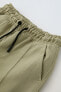 Piqué trousers with seam detail