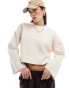 ASOS DESIGN crew neck boxy jumper with wide cuff in cable knit in cream