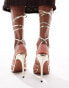 Фото #3 товара ASOS DESIGN Nightly strappy tie leg high sandals in gold