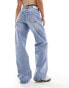 Stradivarius Petite wide leg dad jean with rips in medium wash blue