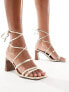 ASOS DESIGN Hideout strappy tie leg mid block heeled sandals in gold