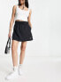 Фото #1 товара Nike Air woven mini skirt in black