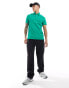 Фото #6 товара Tommy Hilfiger unisex 1985 regular polo in green