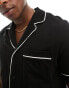 ASOS DESIGN jersey shirt with tipping detail and pocket in black