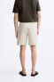 TEXTURED CHINO BERMUDA SHORTS