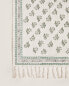 Rectangular floral block print rug with fringing