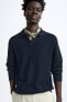 Textured knit polo shirt