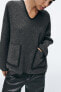 Knit sweater with contrast topstitching