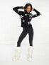 Threadbare Ski roll neck star printed jumper in black