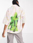 COLLUSION Unisex festival marbled shirt with dinosaur print