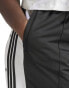 Фото #2 товара adidas Originals Plus adibreak popper pants in black and blue