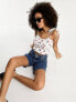 ASOS DESIGN lace trim tie strap top in white based cherry print