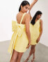 Фото #1 товара ASOS EDITION structured mini dress with statement bow back detail in yellow