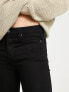 ASOS DESIGN – Hautenge Jeans aus Power-Stretch-Denim in Schwarz mit zerrissenen Knien