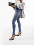 ASOS DESIGN ultimate skinny jeans in distressed blue