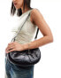 Glamorous crescent shoulder bag with hardware detail in black - фото #1