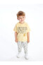 Фото #2 товара Комплект для малышей LC WAIKIKI футболка и штаны с коротким рукавом Winnie The Pooh 2 шт.