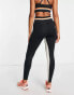 Pink Soda stripe waist band leggings in black