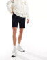 Фото #1 товара River Island waffle textured shorts in navy