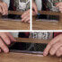 Фото #10 товара Szkło hartowane na ekran iPhone 14 Pro elastyczne z czarną ramką Full Cover Flexi Nano Glass