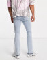 Фото #3 товара ASOS DESIGN stretch flare jeans in light wash blue with side panel and hem detail