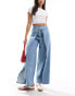 ASOS DESIGN cropped wide leg with wrap skirt waist in light wash blue Helle Waschung, W32 L32 - фото #1