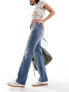 Фото #1 товара Weekday Arrow low waist regular fit straight leg jeans in tuned jackpot blue