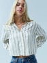 ASOS DESIGN cropped shoulder pad shirt in grey pinstripe