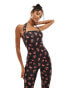 ASOS DESIGN halterneck pedal pusher jumpsuit with square neckline in black ditsy floral