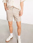 ASOS DESIGN slim chino shorts in mid length in beige