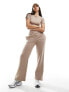 Фото #1 товара In The Style fITS v front wide leg joggers co-ord in mocha