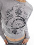 Reclaimed Vintage celestial graphic long sleeve baby tee in charcoal acid wash