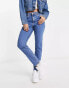 Wrangler high rise skinny jean in midwash blue