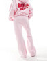 Kaiia design bubble logo wide leg joggers co-ord in pink and red