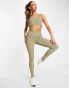 Pink Soda cross waistband leggings in olive