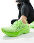 Asics Novablast 4 running trainers in illuminate green and lime burst